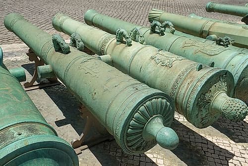 Lisbon, Portugal. Old canons line the courtyard in a former military headquarter. Art Print